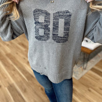 Mae Varsity Distressed Sweater